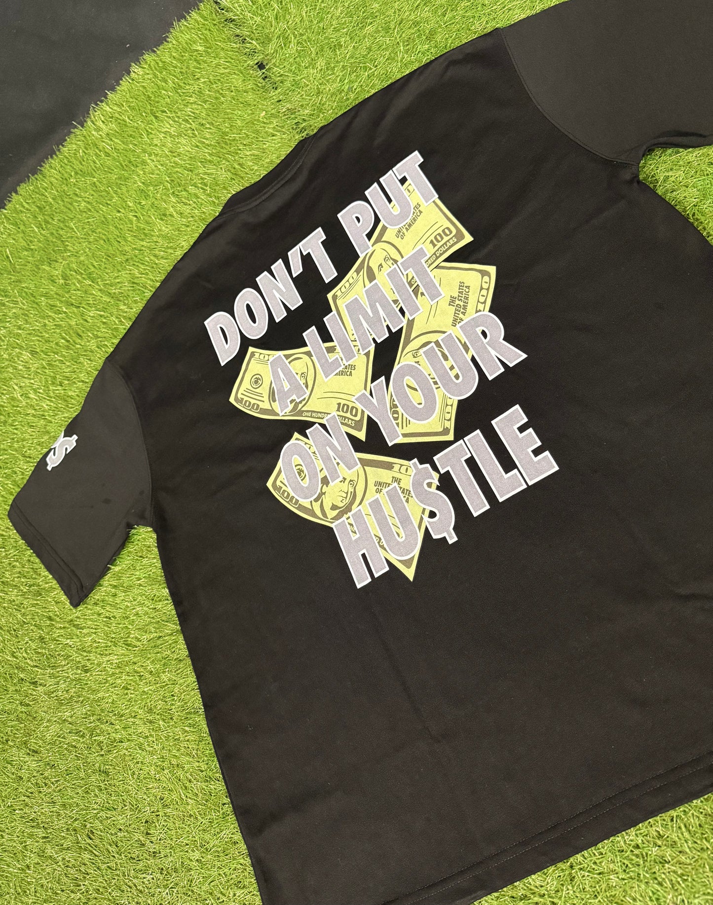 "Don't Limit Your Hu$tle" T-shirt