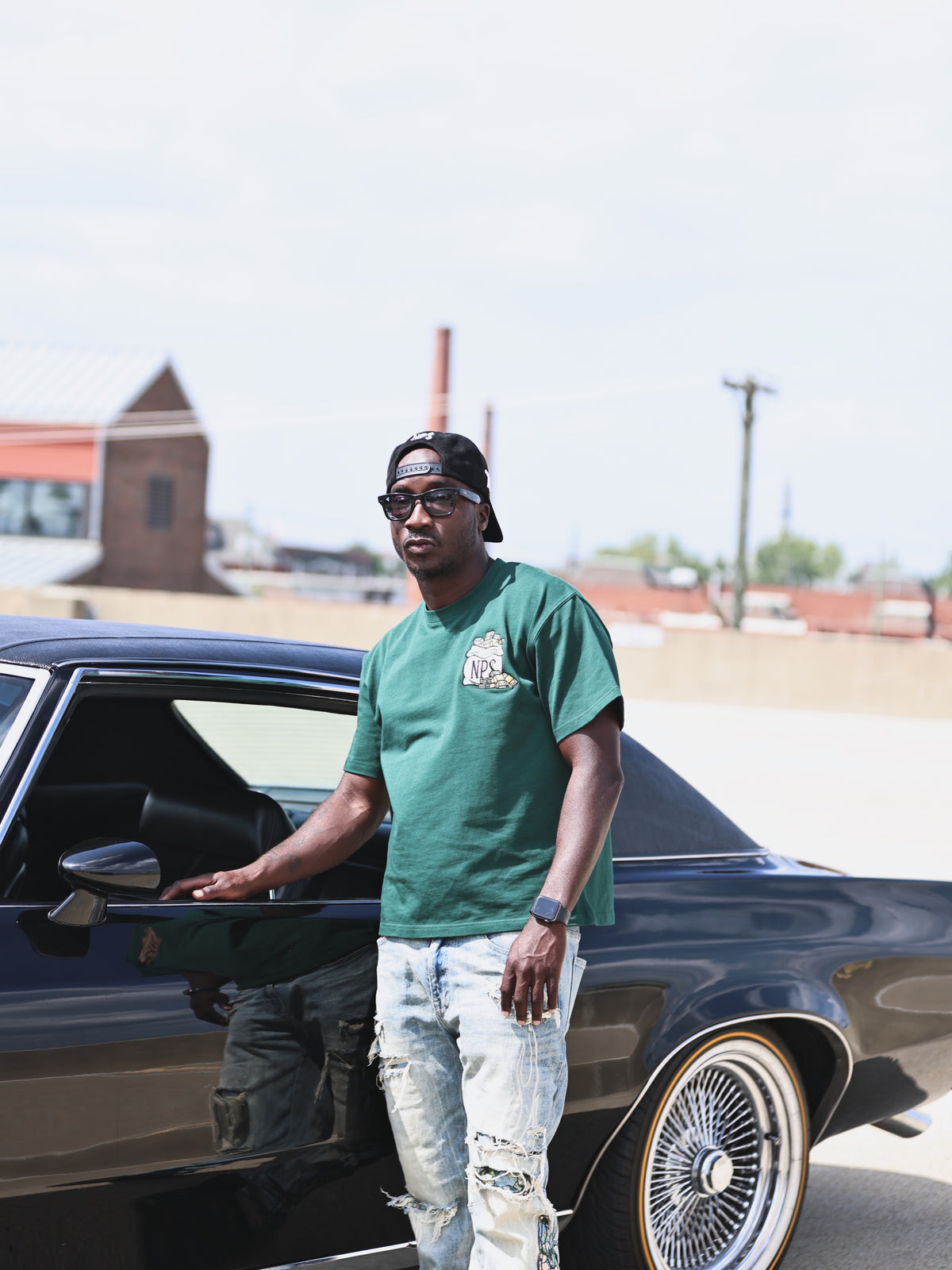The Dream I$ Free But The Hu$tle I$ $old $eparately T-shirt