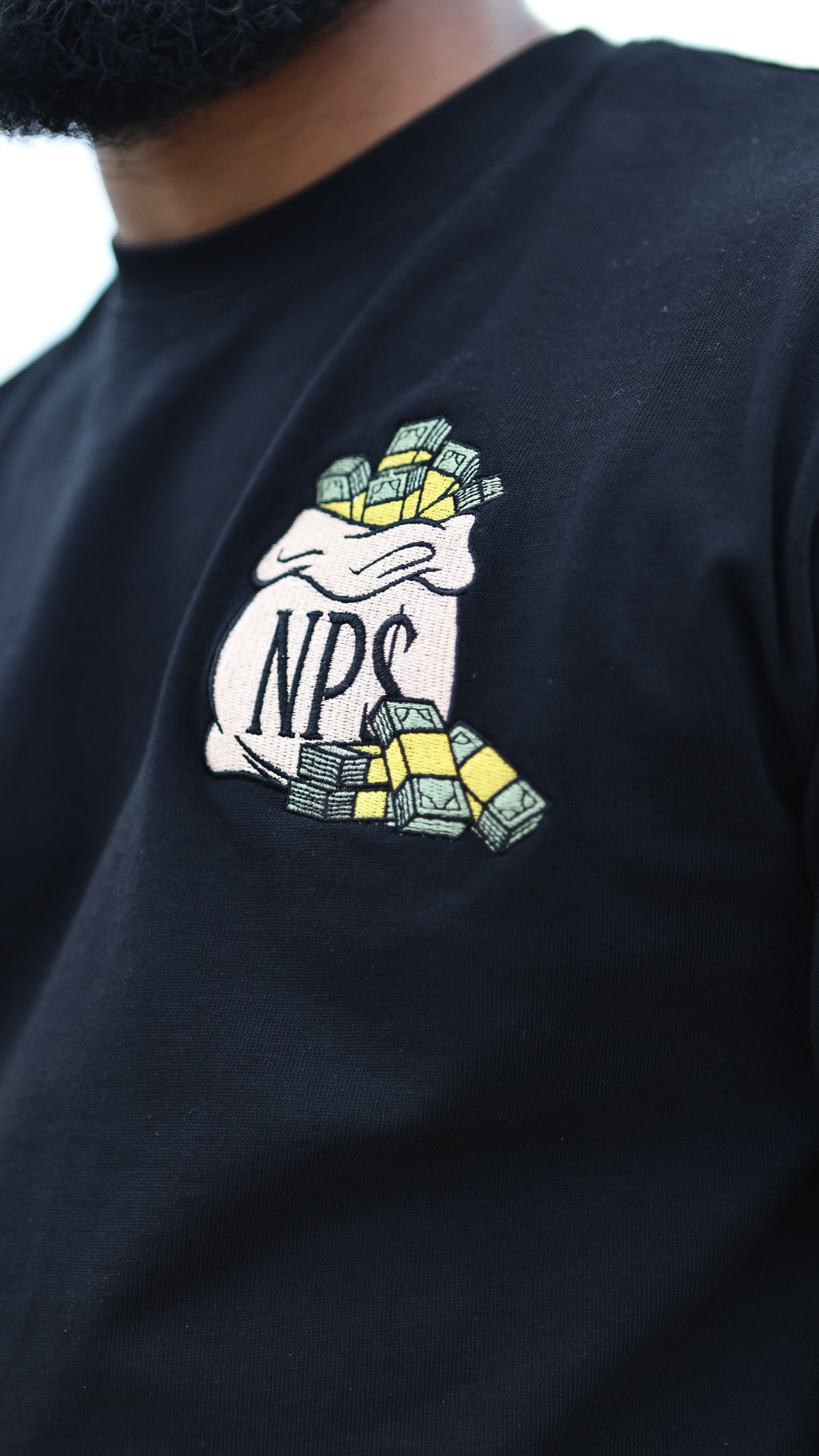 The Dream I$ Free But The Hu$tle I$ $old $eparately T-shirt